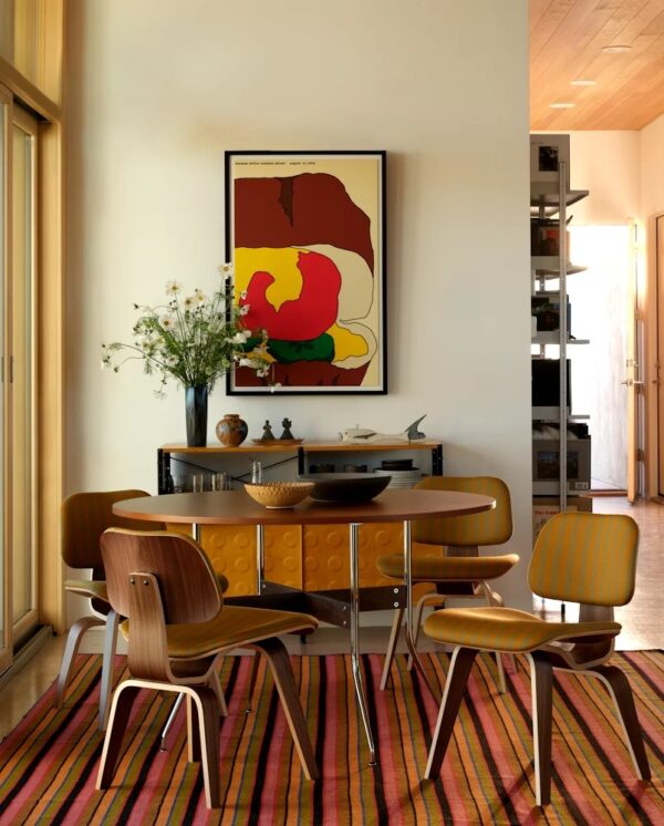photo_5913318249267400099_y Eames Molded Plywood Dining Chair Metal Base (DCM), Upholstered