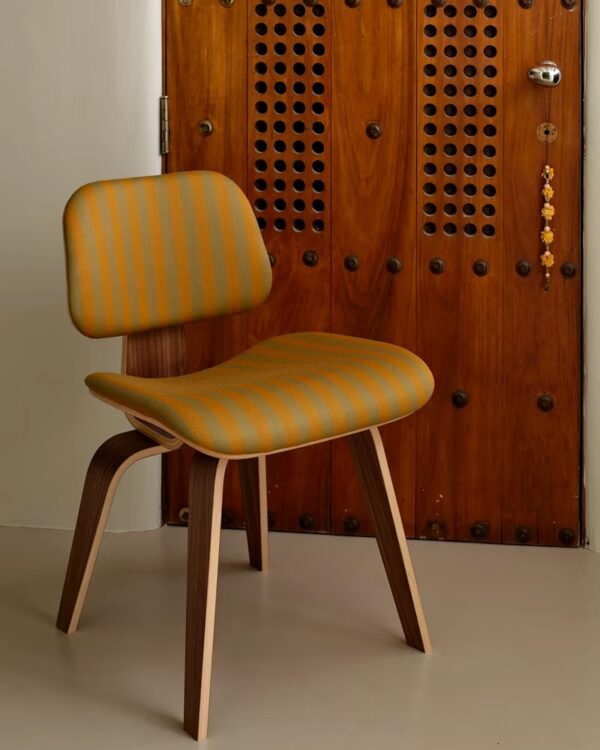 photo_5913318249267400100_y Eames Molded Plywood Dining Chair Metal Base (DCM), Upholstered